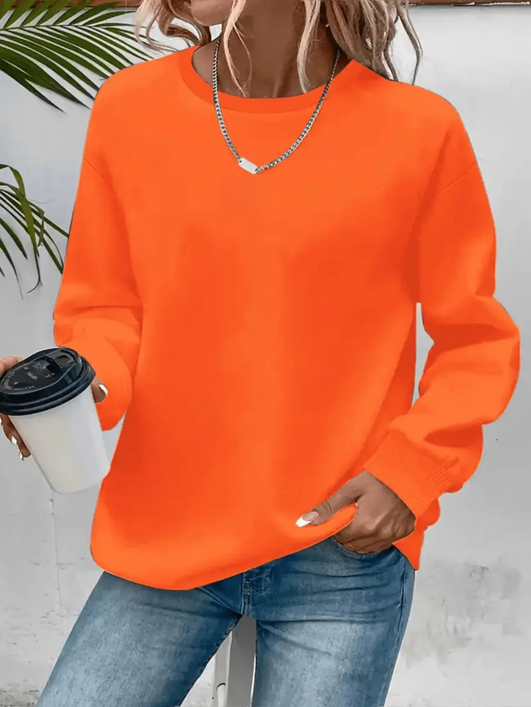Damesweatshirt med rund hals og lange ærmer