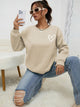 Damesweatshirt med rund hals, lange ærmer og hjerteprint