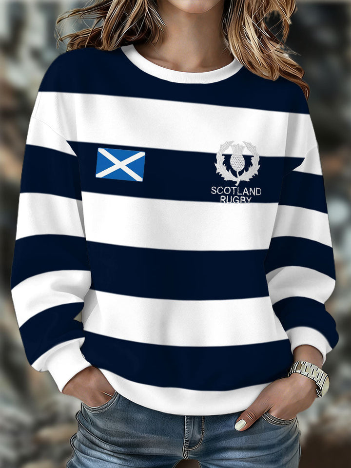 Damesweatshirt med marineblå og hvide striber, skotsk flag og rugbyemblem
