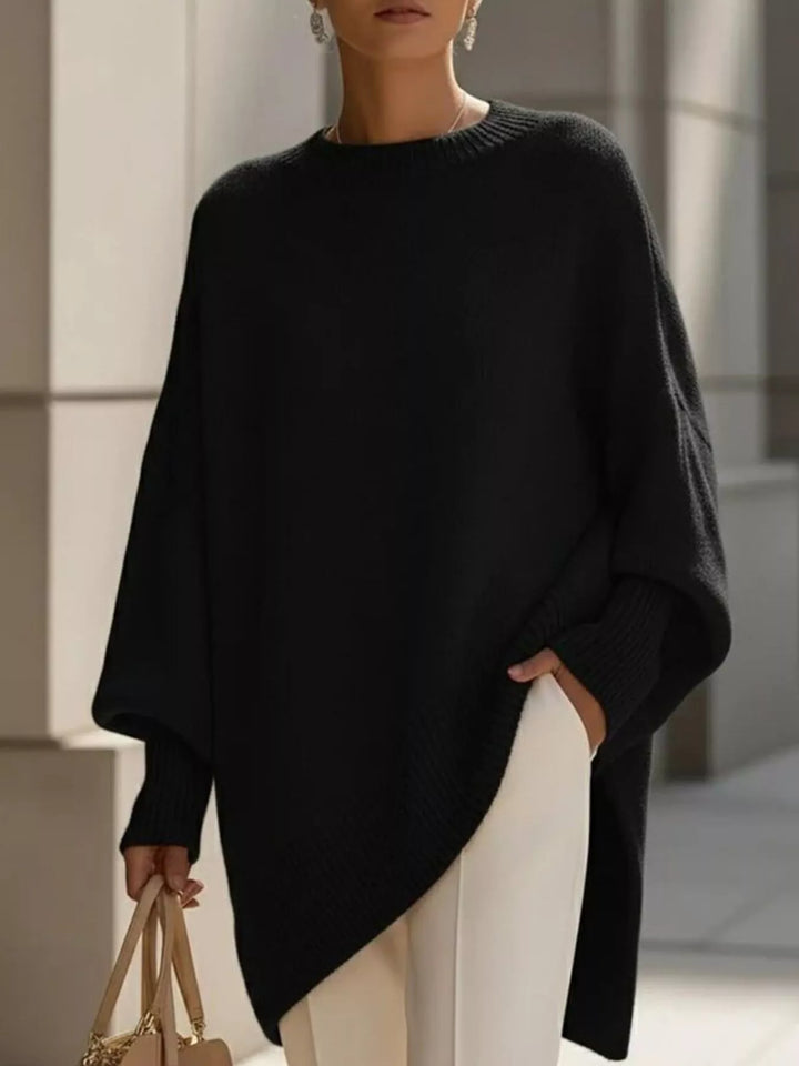 Dame oversized striktrøje med rund hals og ribstrikkede ærmer