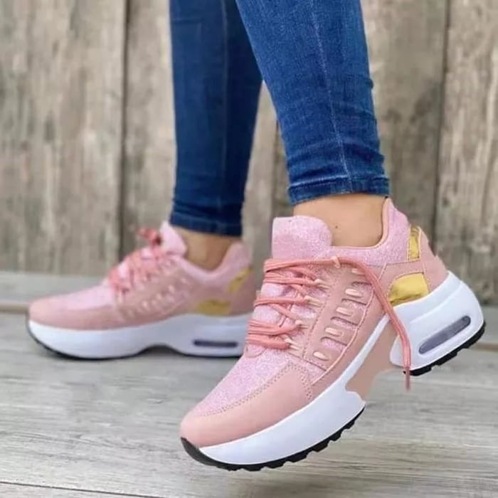 Damesneakers med snørebånd, rund tå og profileret sål