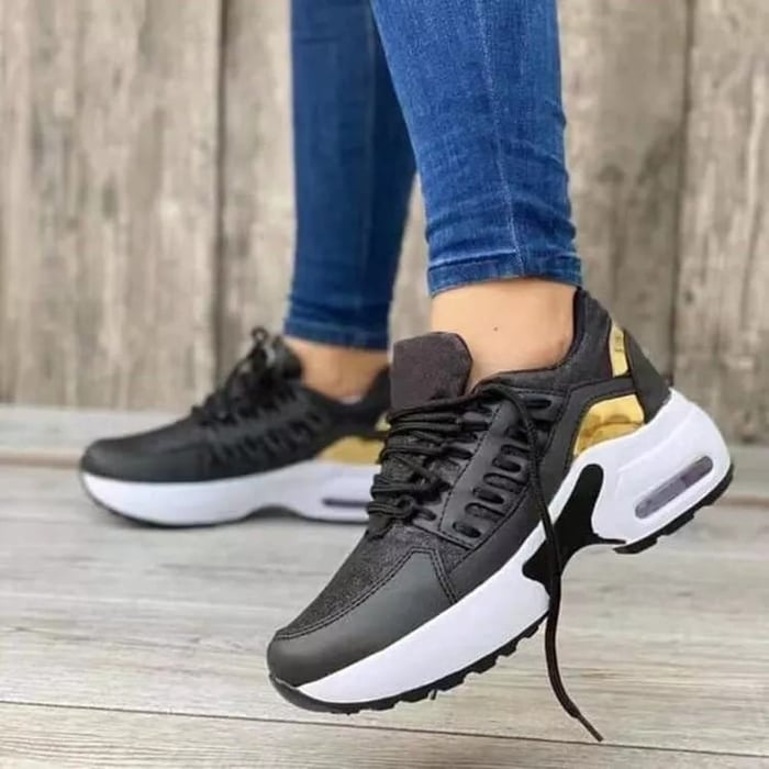 Damesneakers med snørebånd, rund tå og profileret sål