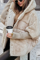 Dame vinterjakke med hætte, pelslook, ribkanter og lynlås