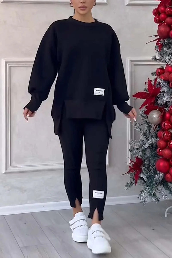Damesæt med langærmet sweatshirt og smalle bukser med elastisk talje