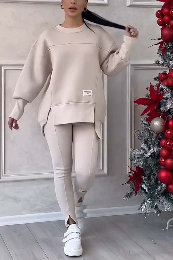 Damesæt med langærmet sweatshirt og smalle bukser med elastisk talje