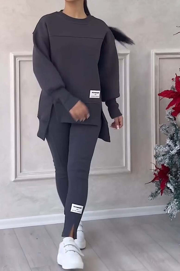 Damesæt med langærmet sweatshirt og smalle bukser med elastisk talje