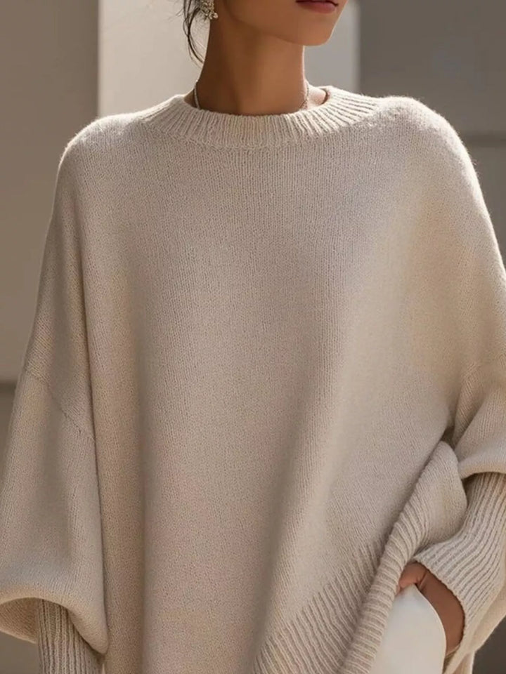 Dame oversized striktrøje med rund hals og ribstrikkede ærmer
