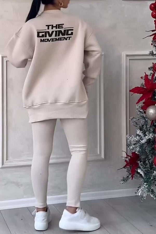 Damesæt med langærmet sweatshirt og smalle bukser med elastisk talje