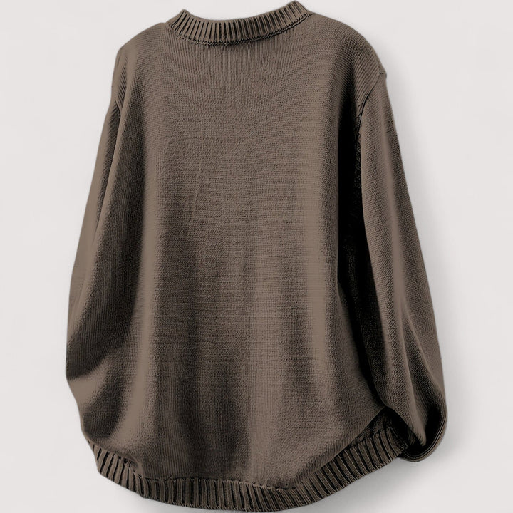 Strikcardigan med rund hals, lange ærmer, ribkanter og farvede knapper