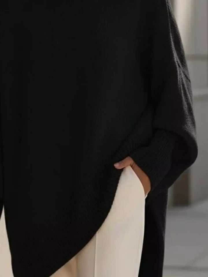 Dame oversized striktrøje med rund hals og ribstrikkede ærmer