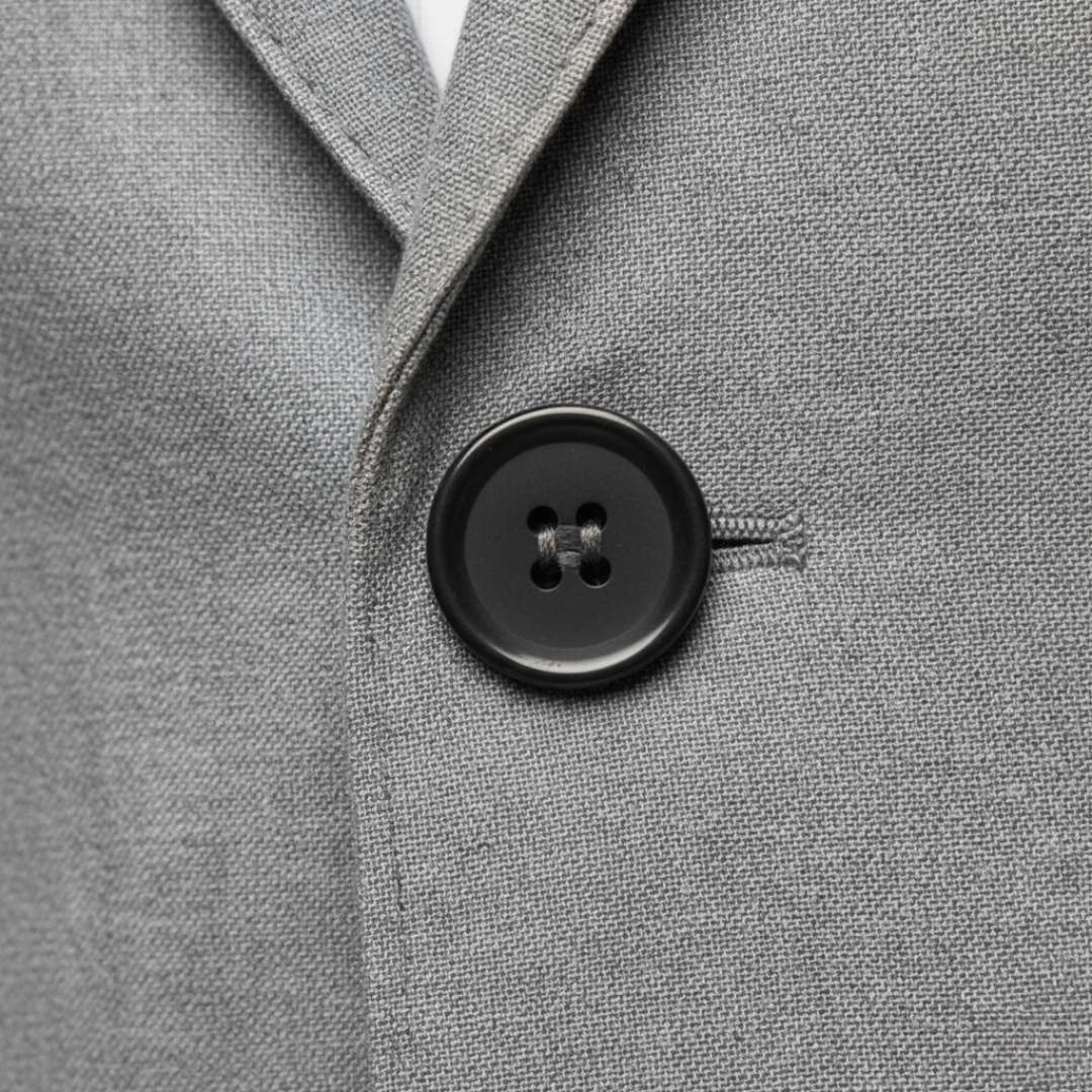Herreblazer med slim pasform, reverskrave, enkelt knap og lommer