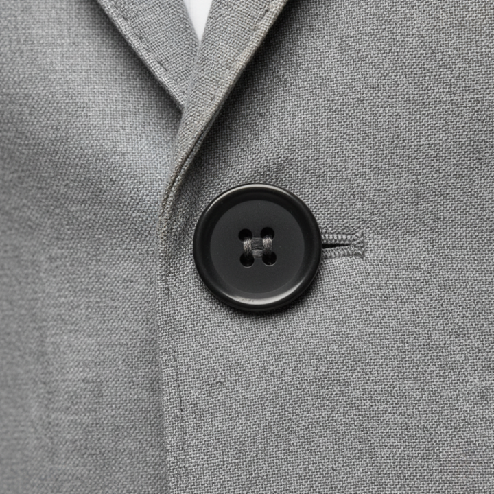 Herreblazer med slim pasform, reverskrave, enkelt knap og lommer