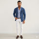 Herreblazer i strikket struktur med revers, knapper og lommer