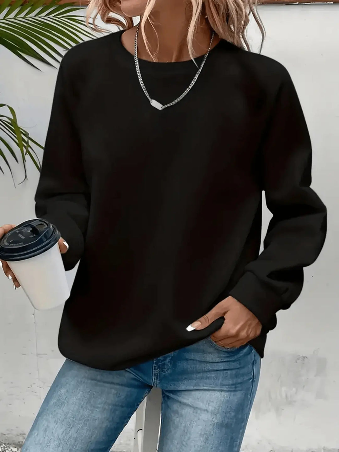 Damesweatshirt med rund hals og lange ærmer