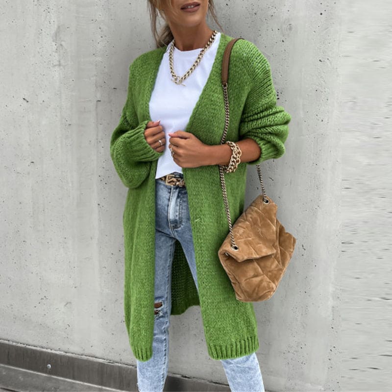 Lang damecardigan i strik med åben front og lange ærmer