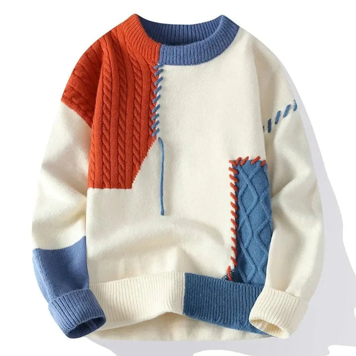 Patchwork striktrøje med rund hals og flerfarvede strikfelter