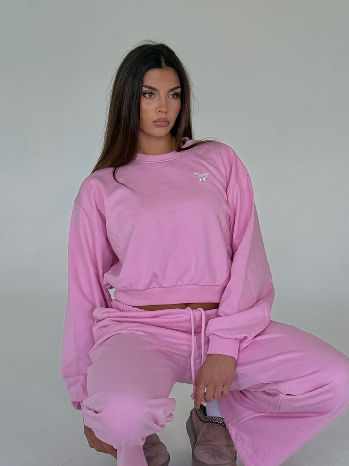 Kort pink sweatshirt til kvinder med rund hals og lange ærmer