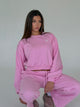 Kort pink sweatshirt til kvinder med rund hals og lange ærmer