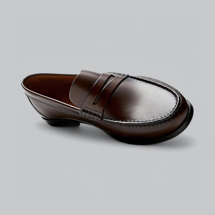 Dame-moccasiner med pennyrem, rund tå og flad hæl