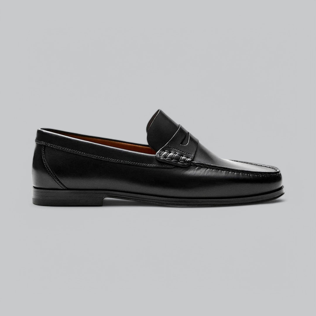 Dame-moccasiner med pennyrem, rund tå og flad hæl