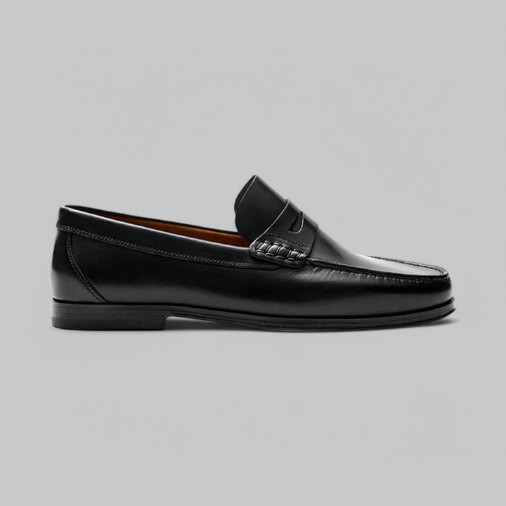 Dame-moccasiner med pennyrem, rund tå og flad hæl
