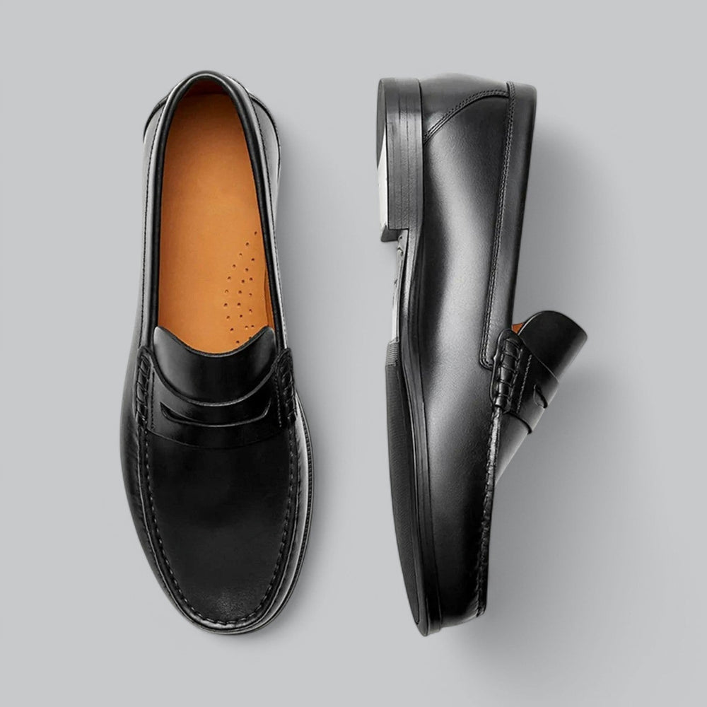 Dame-moccasiner med pennyrem, rund tå og flad hæl