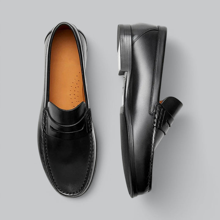 Dame-moccasiner med pennyrem, rund tå og flad hæl