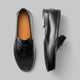 Dame-moccasiner med pennyrem, rund tå og flad hæl