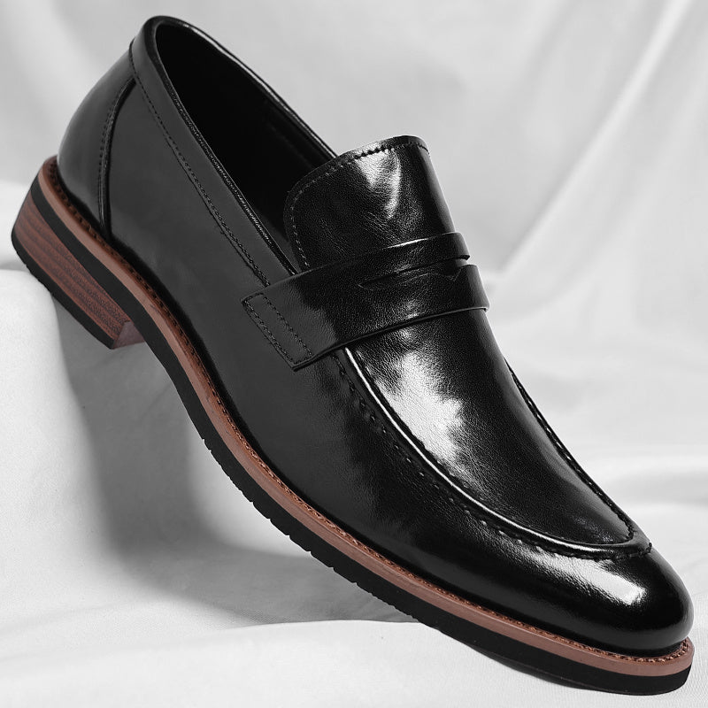 Klassiske penny loafers med rem over vristen og lav hæl