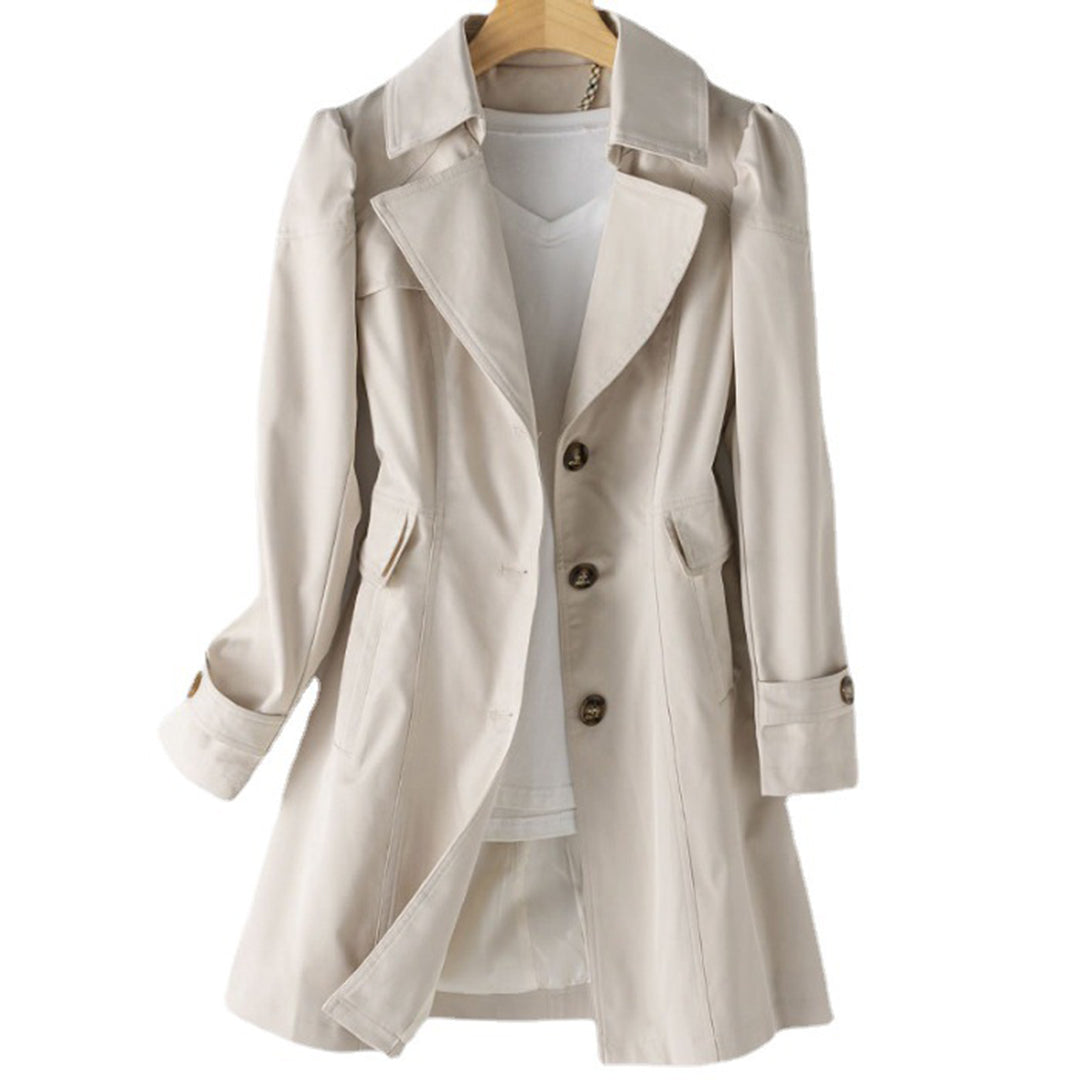 Figursyet dame-trenchcoat med klassisk krave, lange ærmer, knapper og skrå lommer