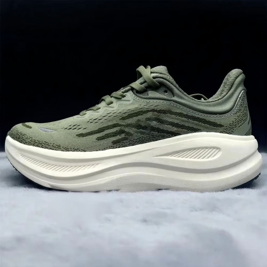 Sneakers i strikket mesh med snøring og høj profileret mellemsål