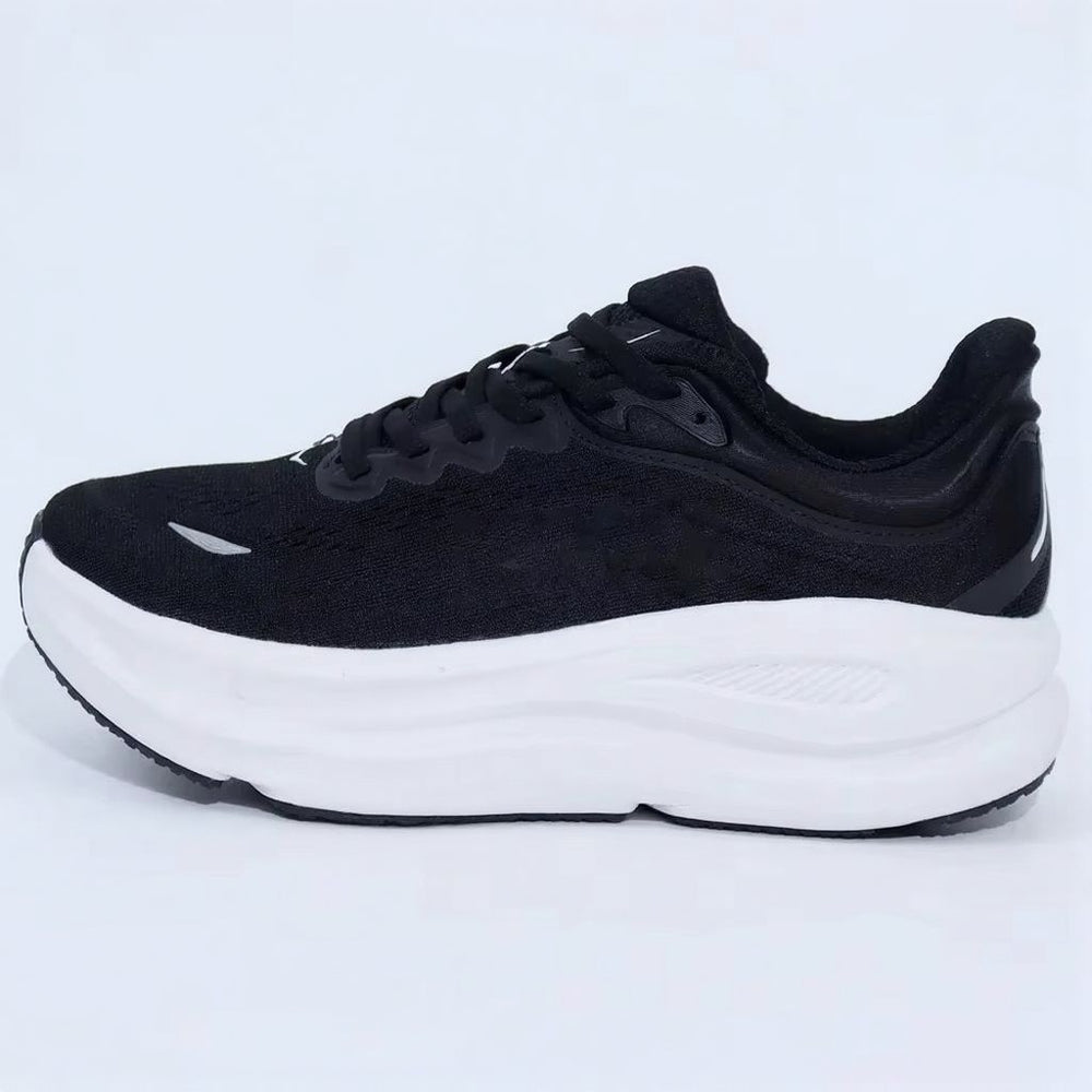 Sneakers i strikket mesh med snøring og høj profileret mellemsål
