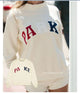 Pink croppet sweatshirt med tekstprint og rund hals