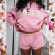 Pink croppet sweatshirt med tekstprint og rund hals