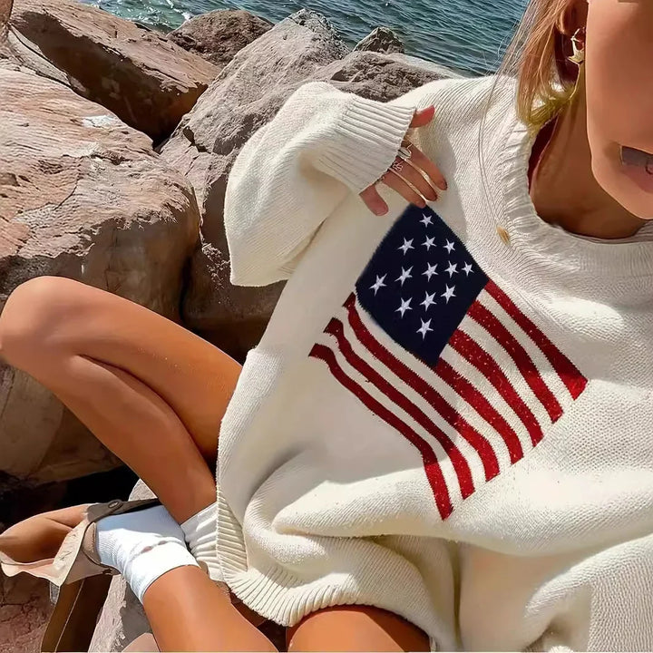 Damestriktrøje med flagmotiv, rund hals og lange ærmer