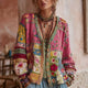 Rosa strikket cardigan med blomstret patchwork og lange ærmer