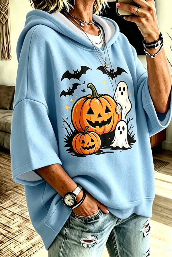 Damehættetrøje med oversized snit og grafisk Halloween-print med græskar og spøgelser