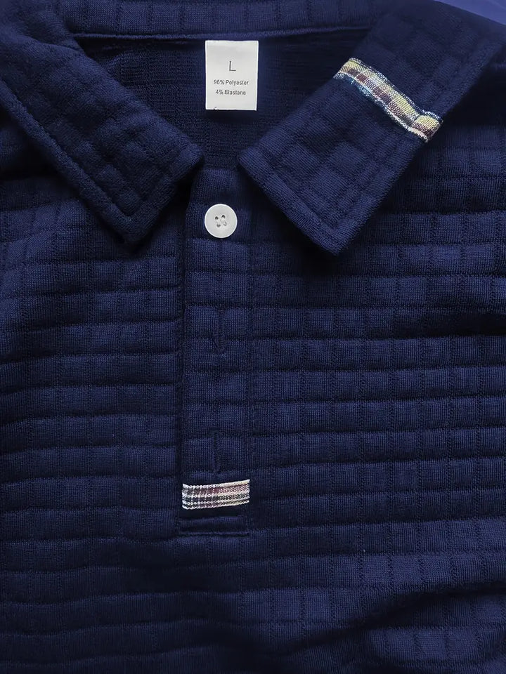 Langærmet herrepoloshirt med quiltet struktur, krave og lynlåslomme på ærmet