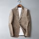 Herreblazer med ribbet struktur, revers, to knapper og lommer