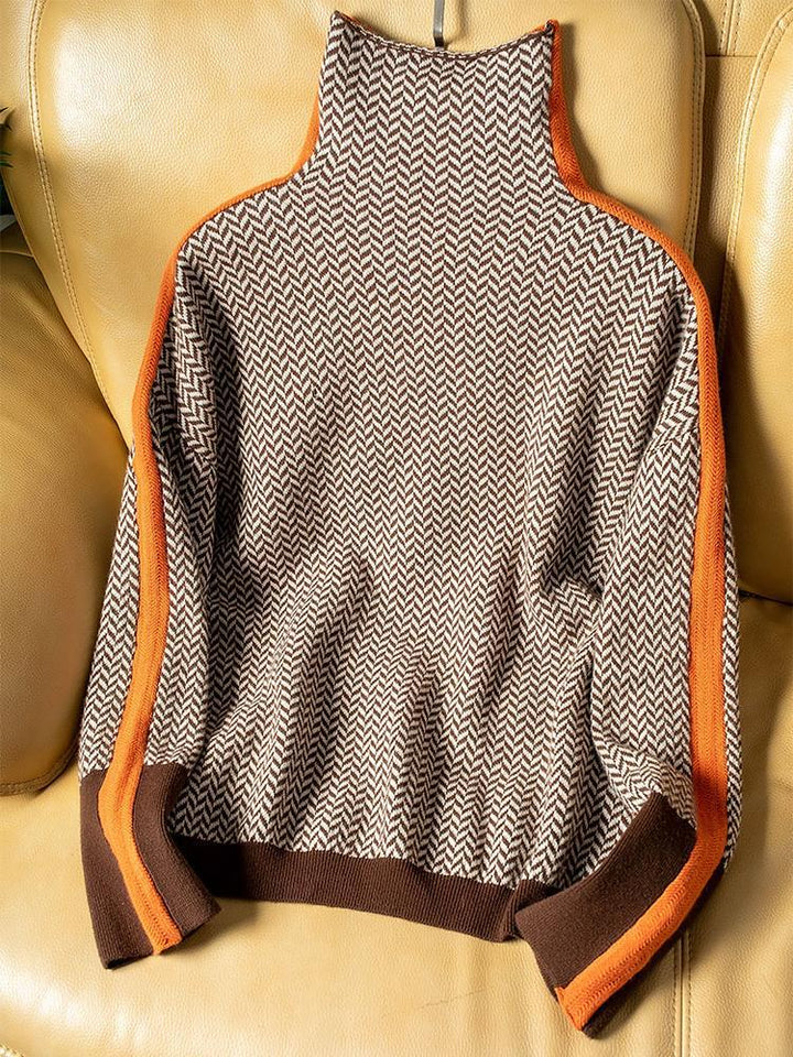Damebluse med rullekrave, zigzagmønster og lange ærmer