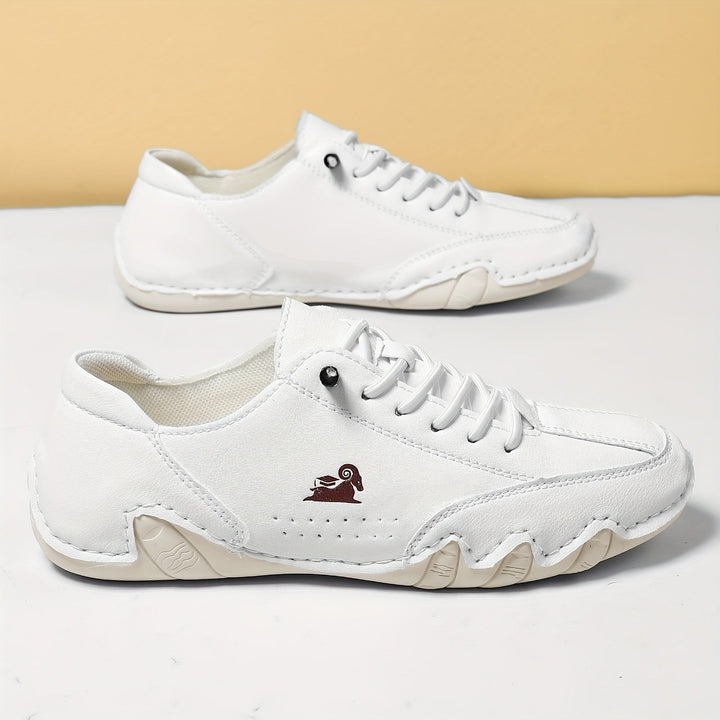 Unisex sneakers med snørebånd, rund tå og lav profil