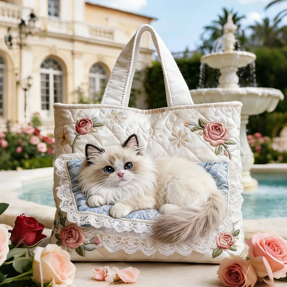 Quiltet shopper med dobbelt håndtag og dekorativt blomstret kunstmotiv