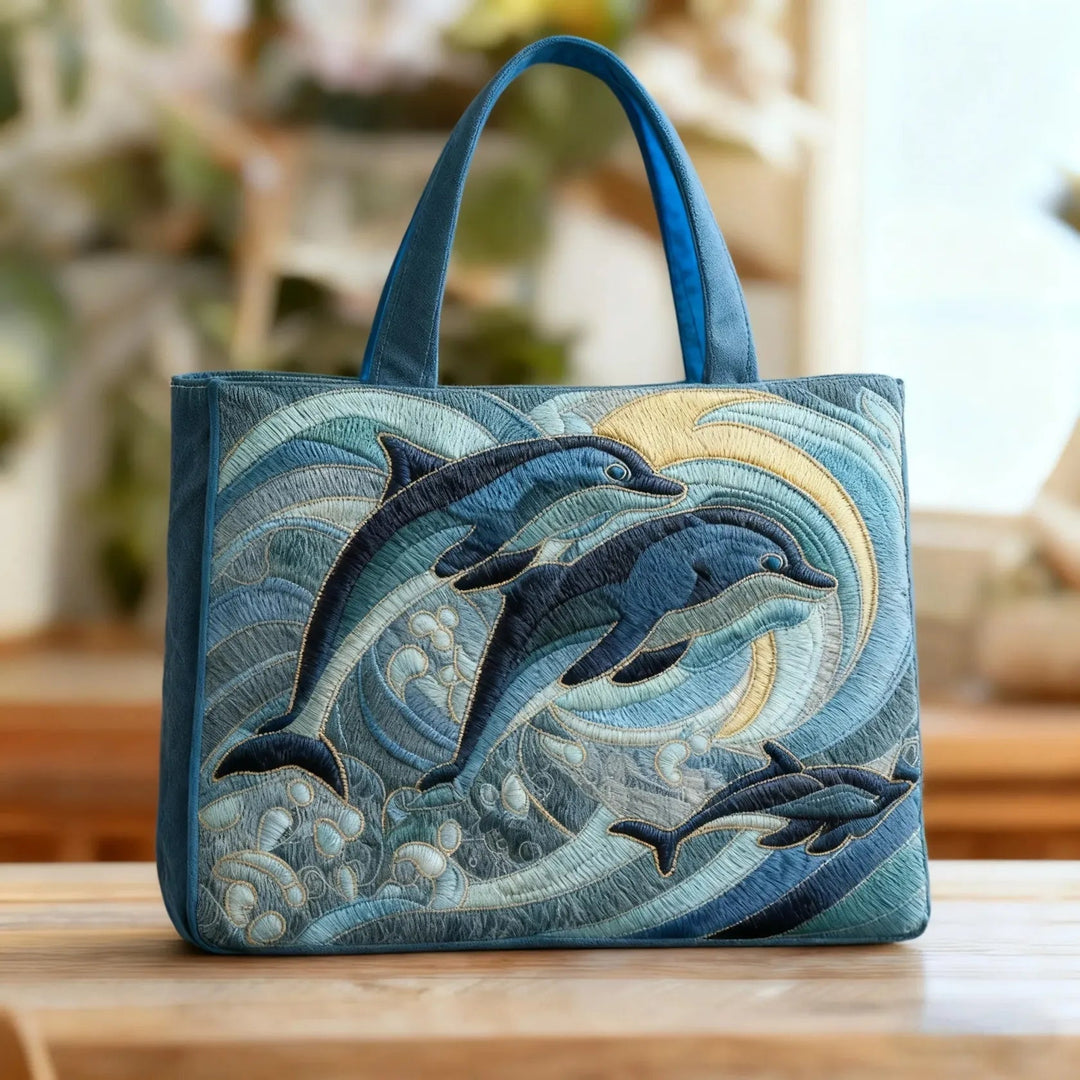 Quiltet shopper med dobbelt håndtag og dekorativt blomstret kunstmotiv
