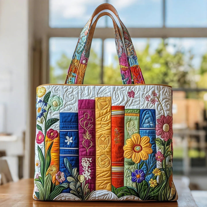 Quiltet shopper med dobbelt håndtag og dekorativt blomstret kunstmotiv