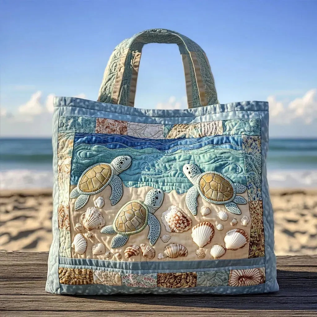 Quiltet shopper med dobbelt håndtag og dekorativt blomstret kunstmotiv