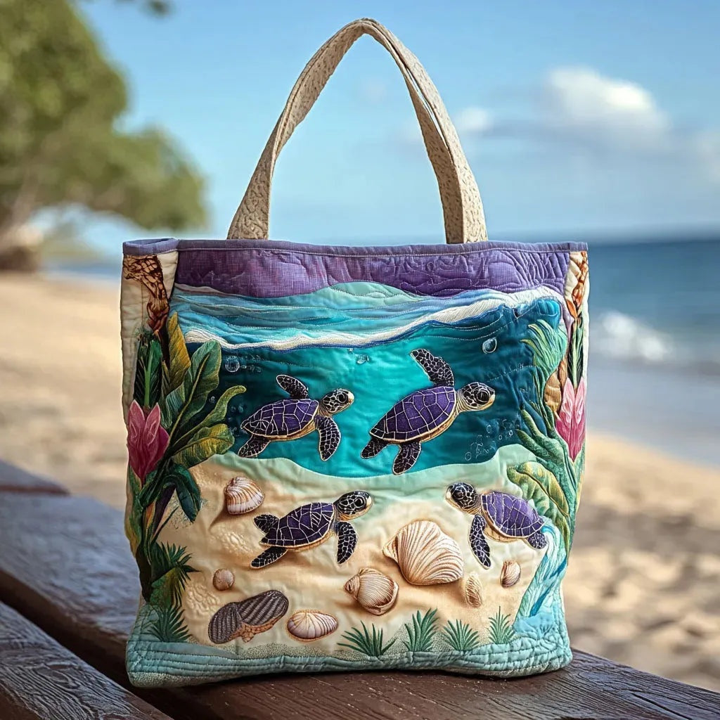 Quiltet shopper med dobbelt håndtag og dekorativt blomstret kunstmotiv