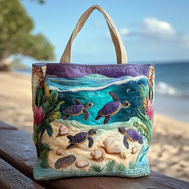 Quiltet shopper med dobbelt håndtag og dekorativt blomstret kunstmotiv