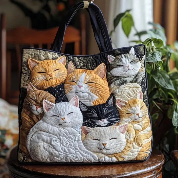 Quiltet shopper med dobbelt håndtag og dekorativt blomstret kunstmotiv