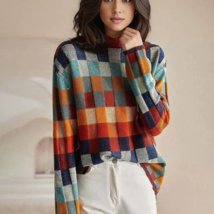 Damesweater med rullekrave og flerfarvet ternet patchwork