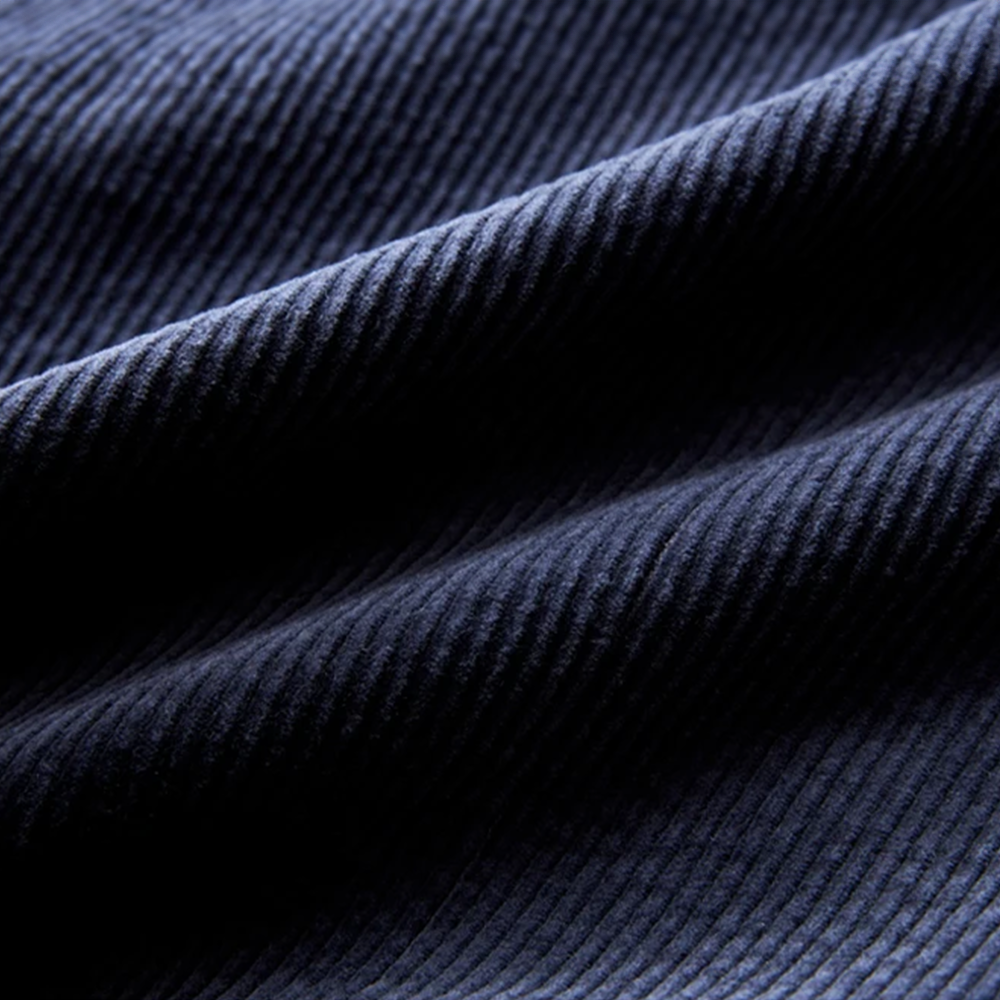 Herreblazer med ribbet struktur, revers, to knapper og lommer